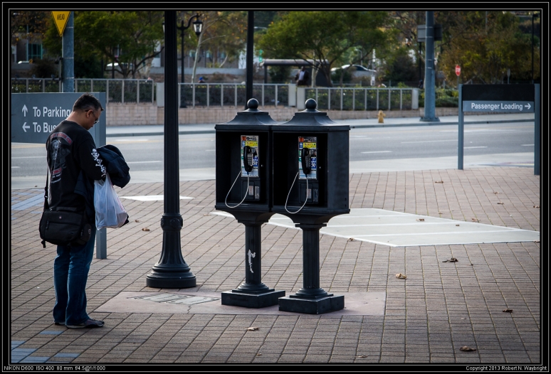 Ed collecting images for the his continuing "Payphone Project"