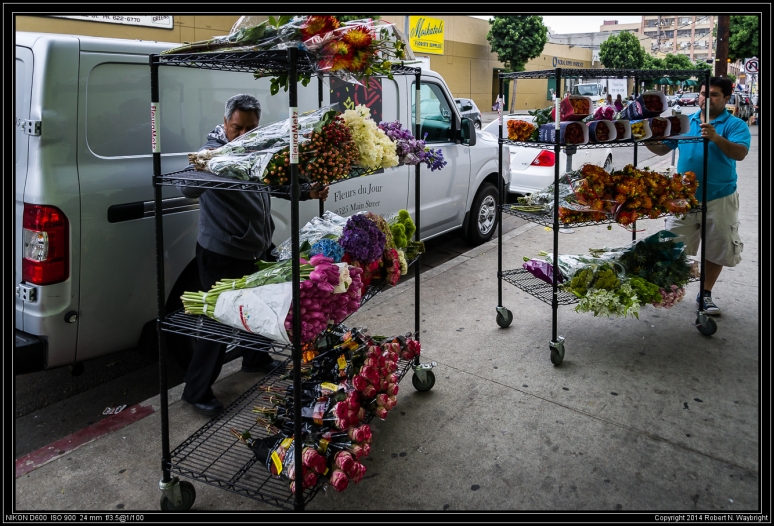 Florists grabbing their day’s haul at the Central Los Angeles Flower Market